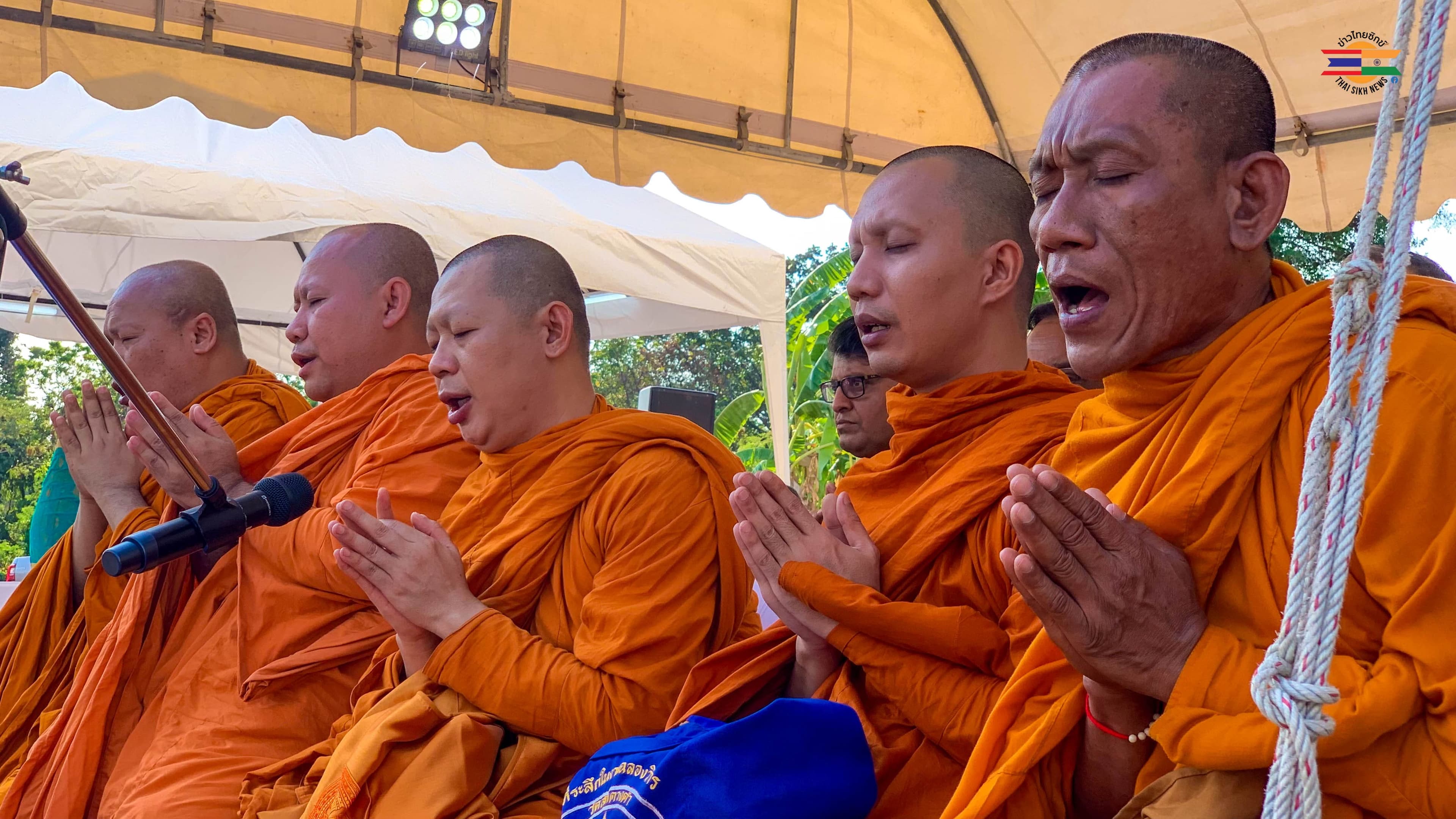 Monks in prayer during traditional ceremony